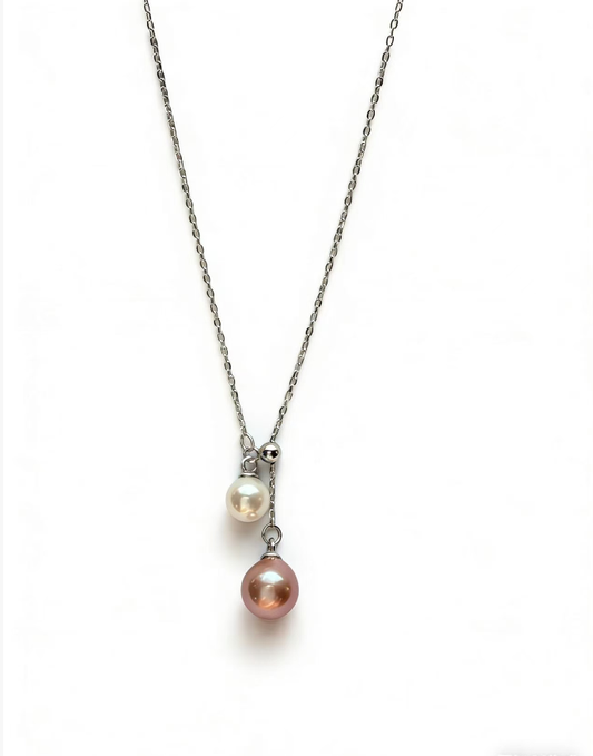 925 sterling silver necklace with a 6-7mm peach pink and 4-5mm white freshwater pearl pendant.